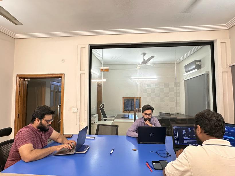 Eye4Tech engineers working at their desks in the Lahore office